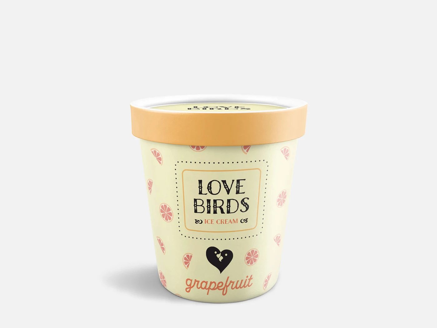 Love Birds grapefruit pint with a pink grapefruit-slice pattern and orange lid